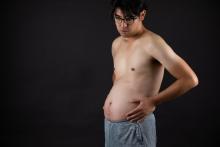 Man with bloated belly